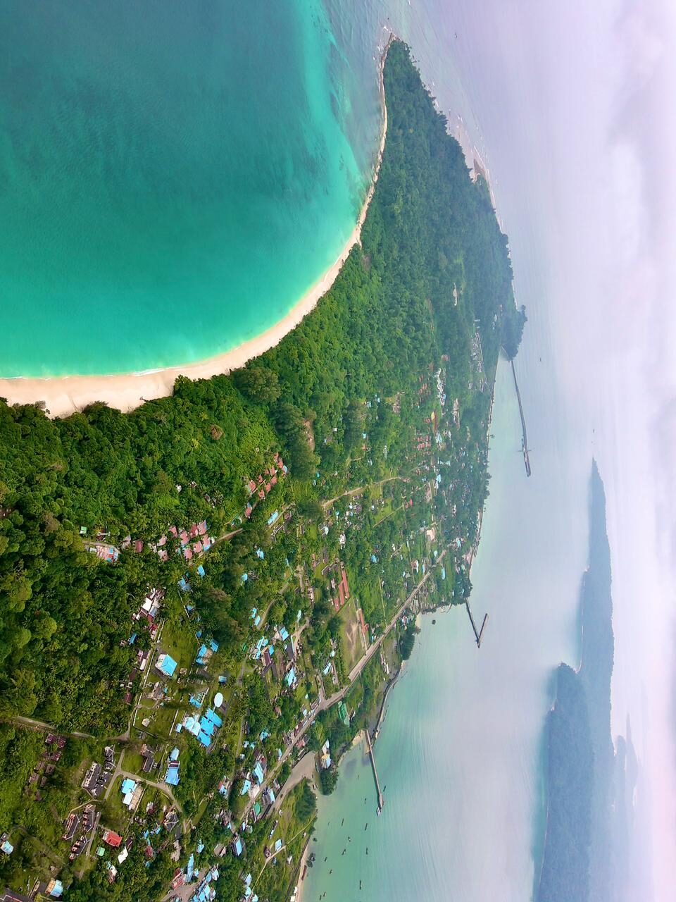 Vridhi travelers group photo on an Andaman beach during a customized island tour